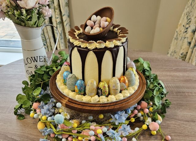 Easter egg cake decorated with spring flowers at Oadby Manor Care Home in Oadby, Leicestershire