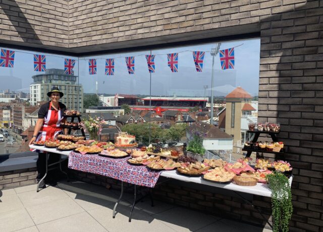 Sandwich platters on table with British flags at Tanglewood Care Home,